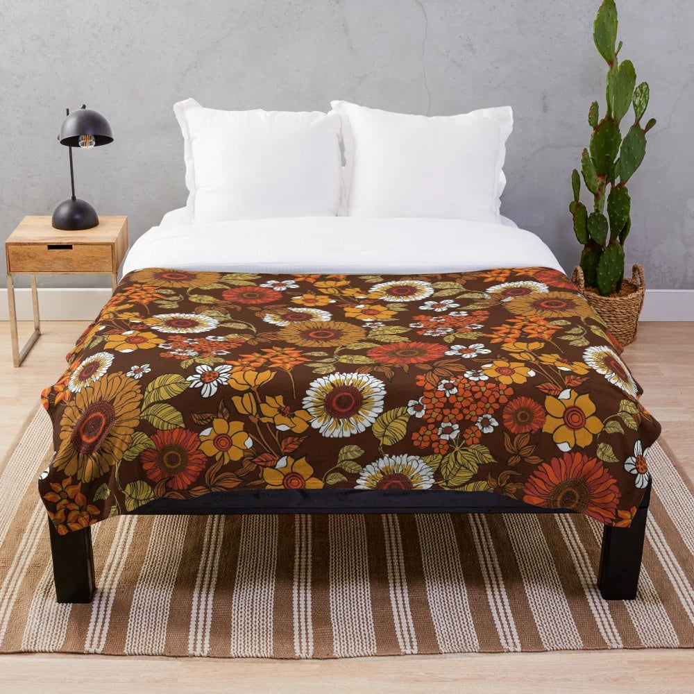 Retro 70s inspired floral plush blanket with boho, hippie flower power design