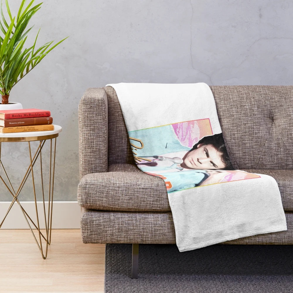 Colorful plush blanket featuring the 80s Springfield band design