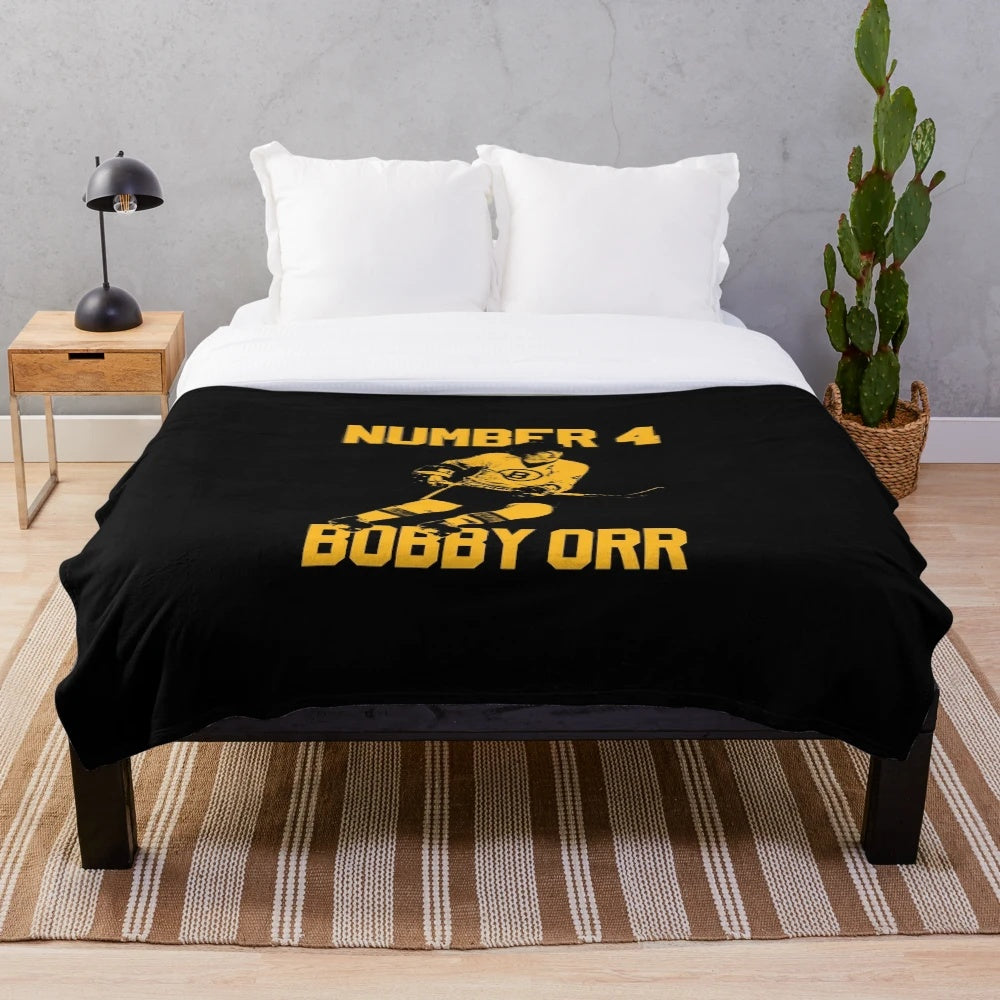 Plush blanket featuring a vintage Bobby Orr inspired design