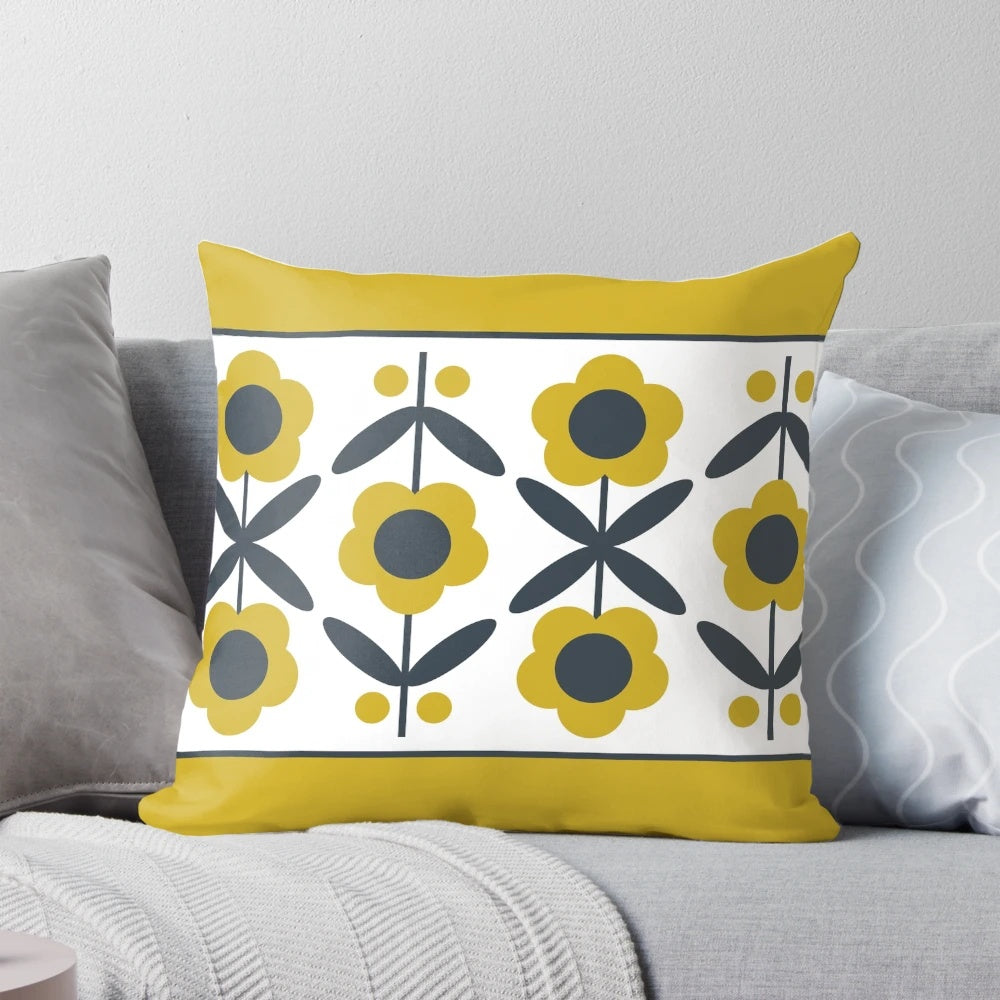 Retro-styled mustard yellow floral pattern pillow with a mid-century modern design