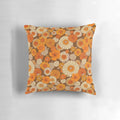 Colorful retro floral pattern pillow in shades of orange and brown