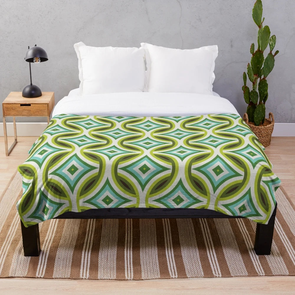 Retro geometric turquoise, green, and brown patterned plush blanket