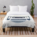 Vintage-style cassette player plush blanket with minimalist design