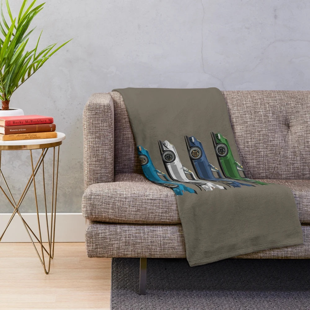 Plush blanket with classic car, racing, and manga inspired design