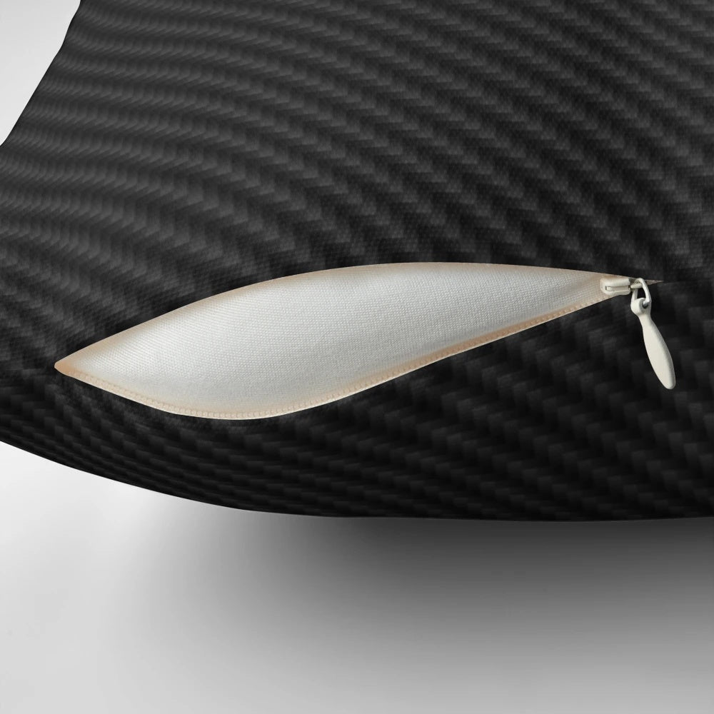 Aston Martin logo on a black carbon fiber background printed on a throw pillow