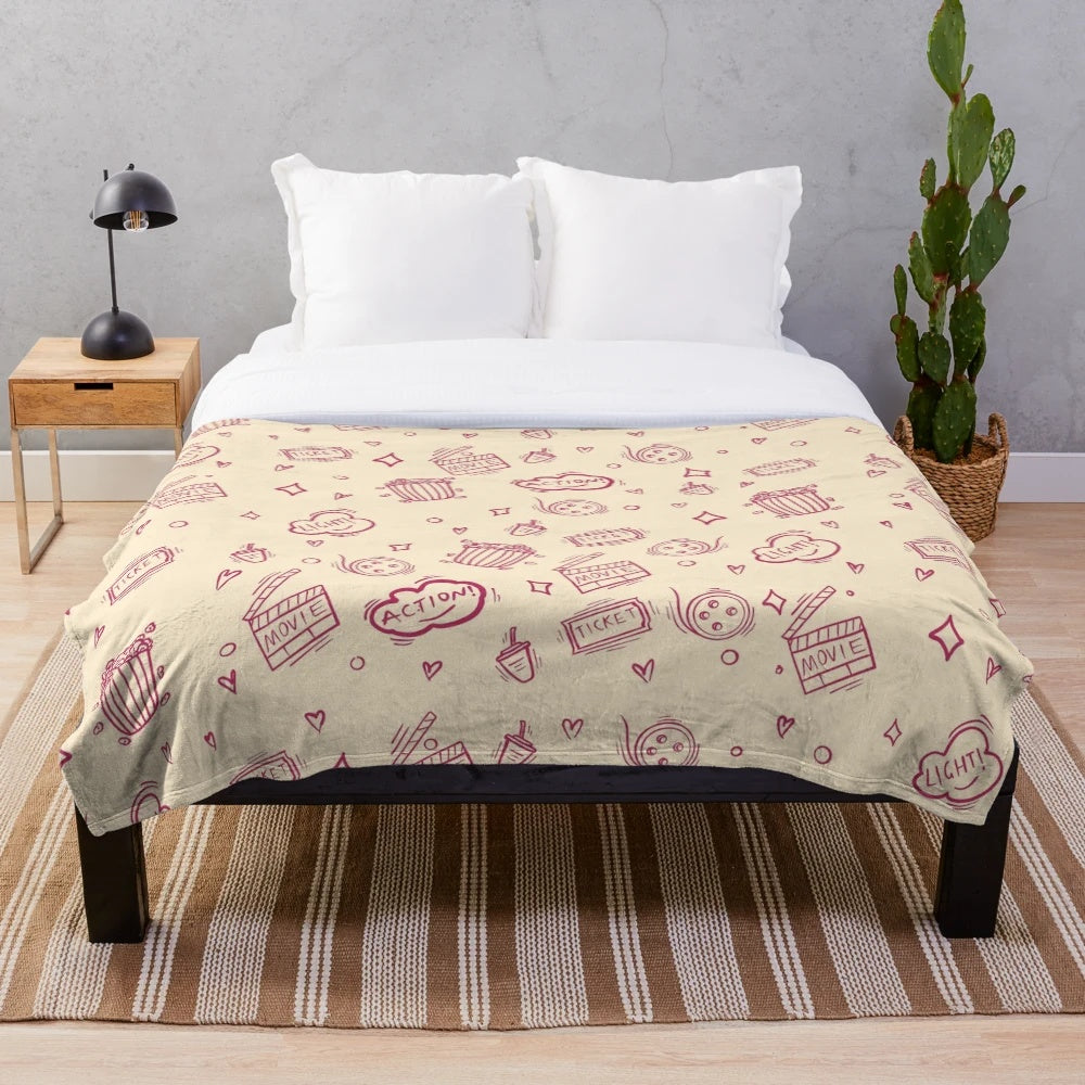 Plush blanket with a retro movie pattern design