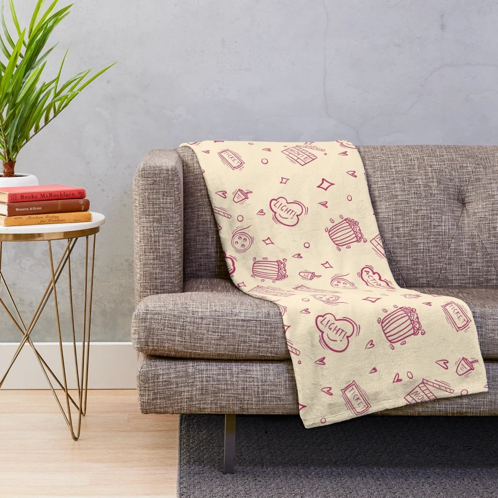 Plush blanket with a retro movie pattern design