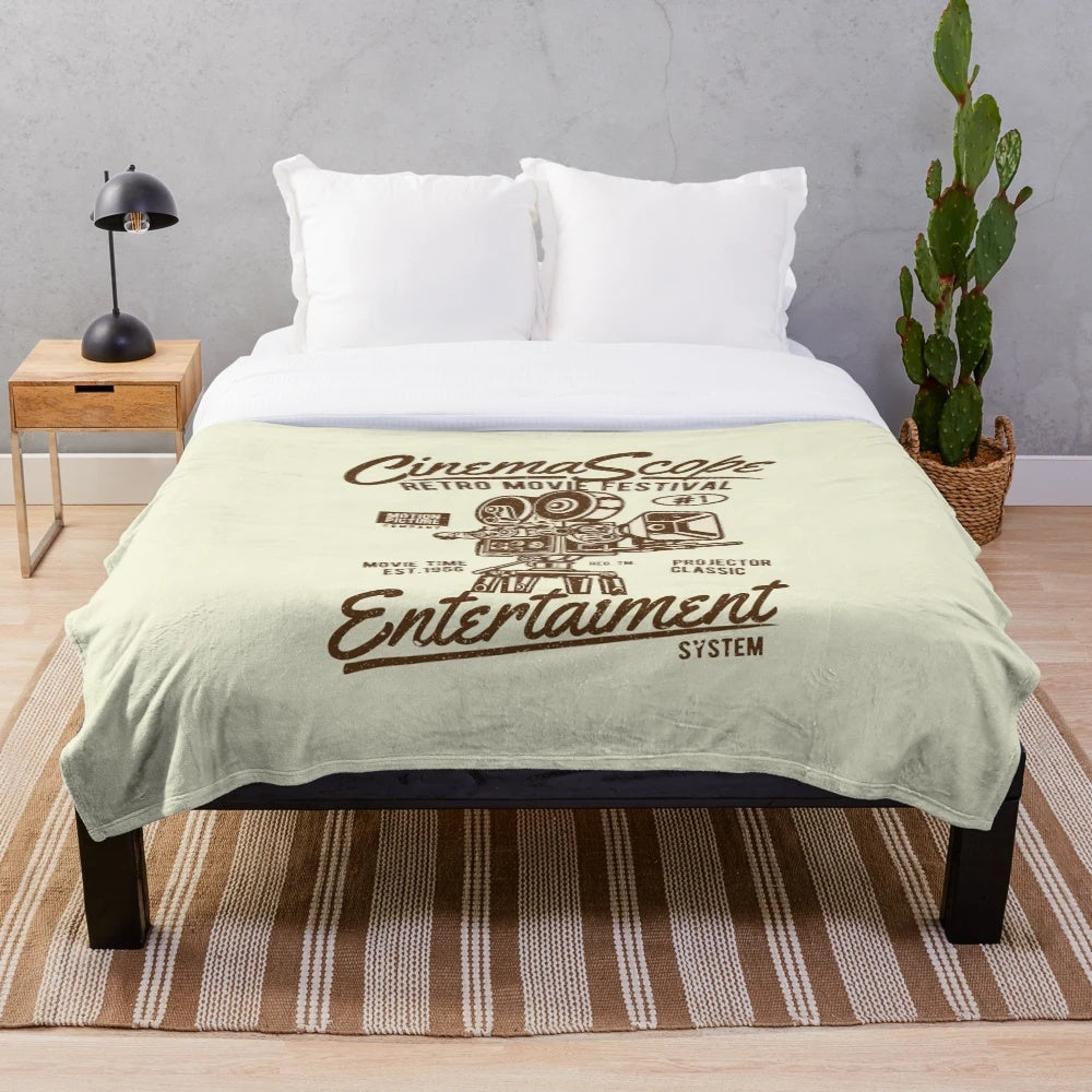 Retro movie-themed plush blanket with classic cinema motifs