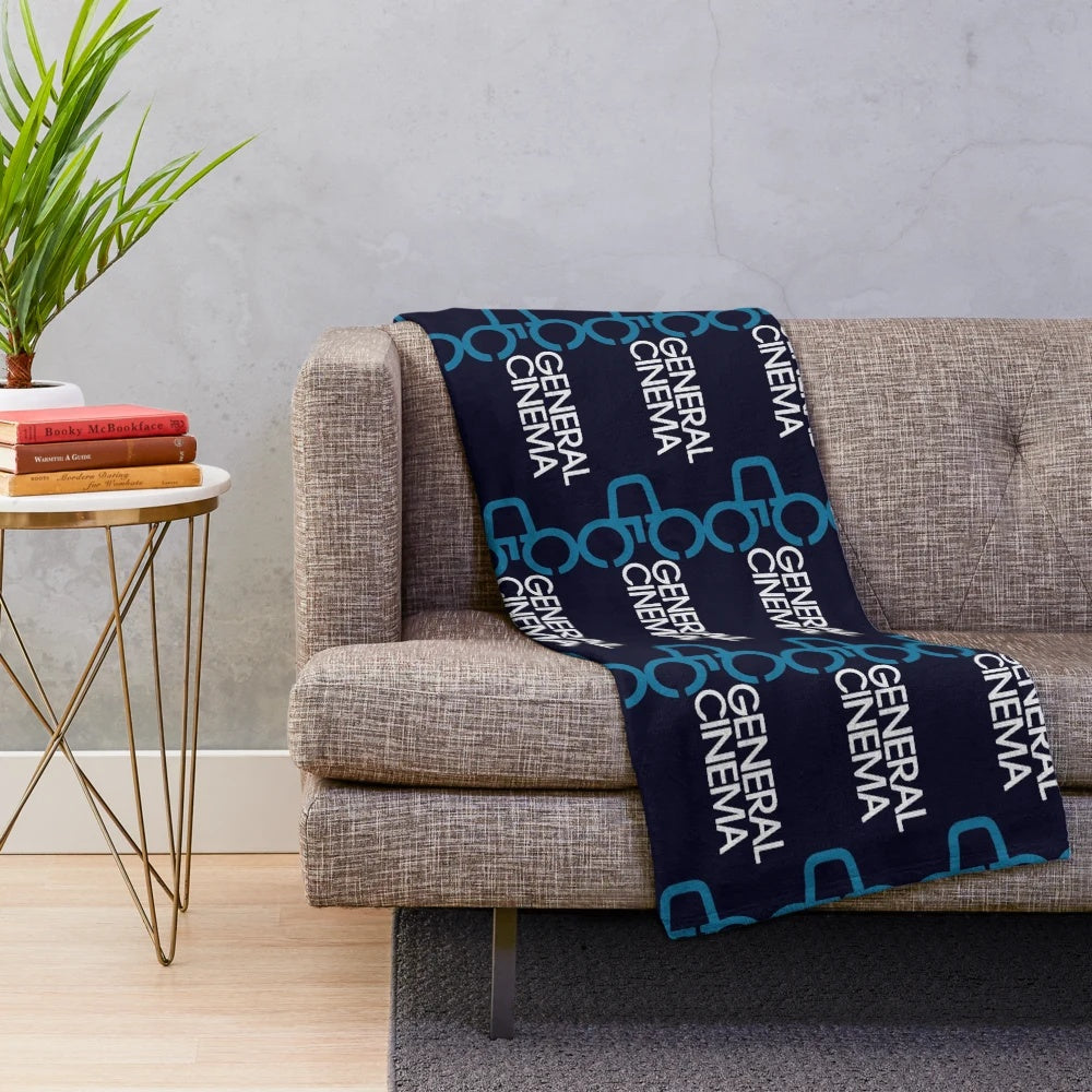 Plush blanket featuring the logo of a defunct movie theater from the 80s/90s
