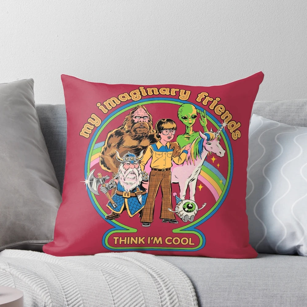 A fluffy, colorful pillow featuring a playful group of imaginary and mythological friends, including an alien, Bigfoot, a dwarf, and a unicorn.