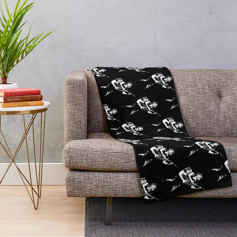 Retro plush blanket featuring a stencil design for classic rock fans