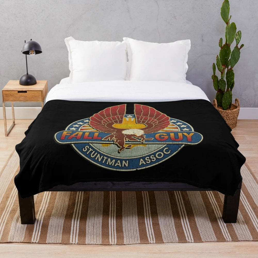 Vintage plush blanket featuring retro stuntman imagery