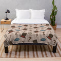 Professor Layton inspired plush blanket with a repeated pattern design in brown and cream