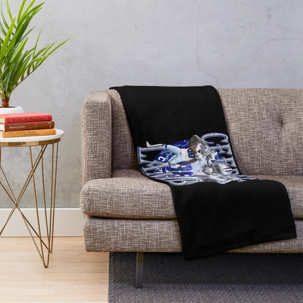Soft, plush blanket featuring the image of football player CeeDee Lamb