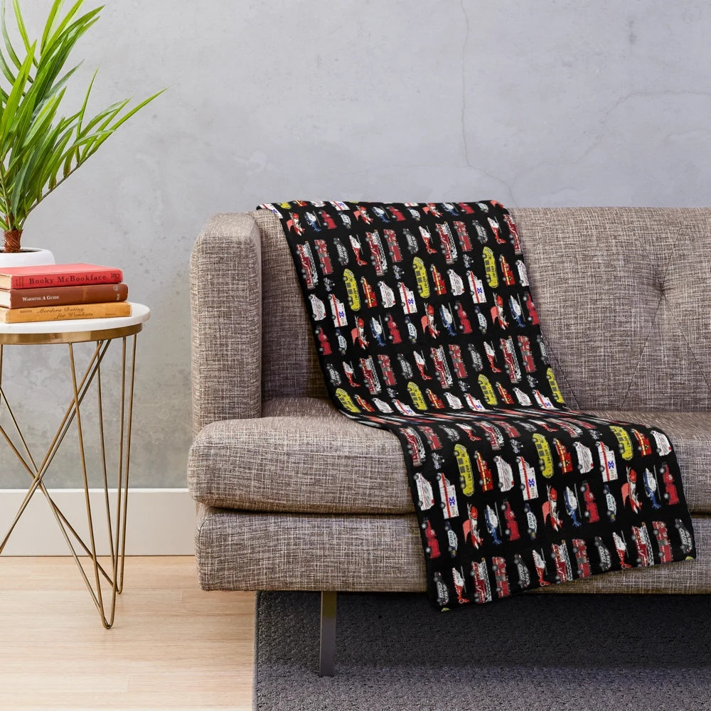 Retro-style plush blanket featuring emergency vehicles and video game-inspired design