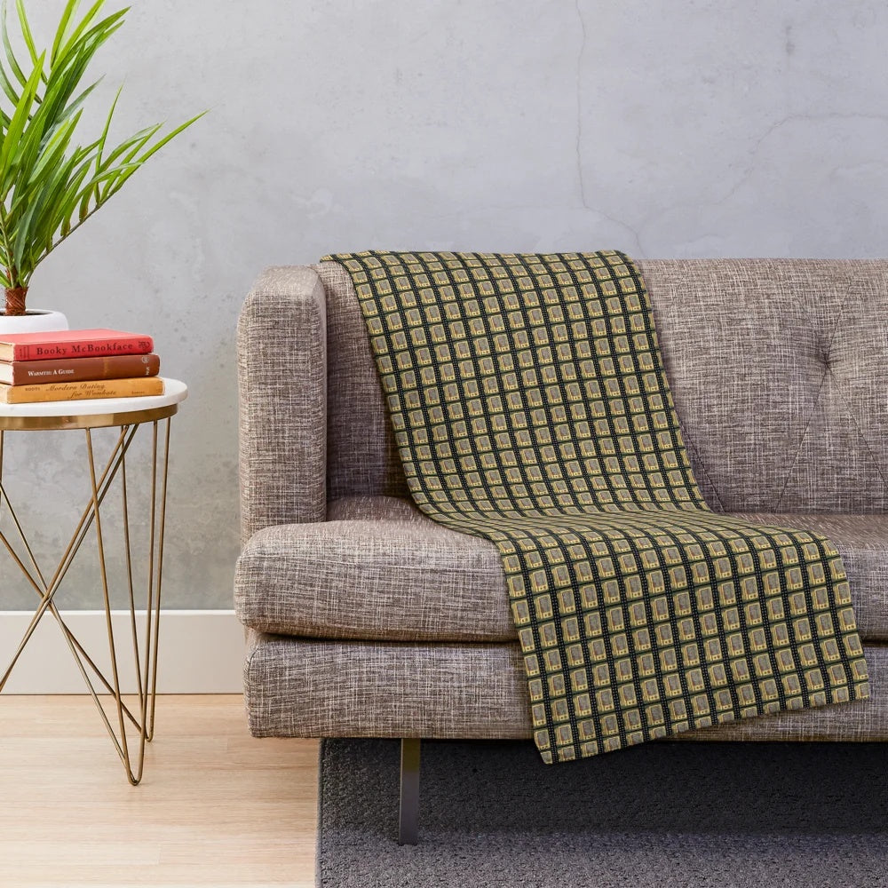 Plush blanket featuring a retro television design with floral and landscape elements