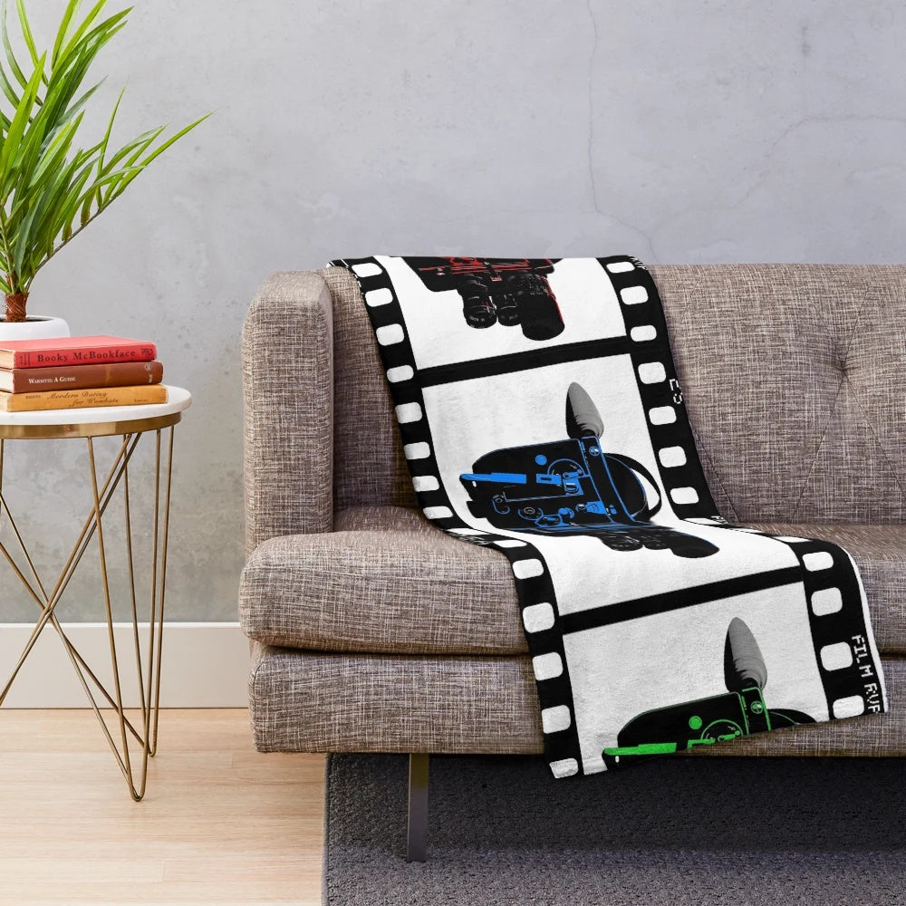 Retro vintage plush blanket featuring a film strip design in red, green, and blue colors