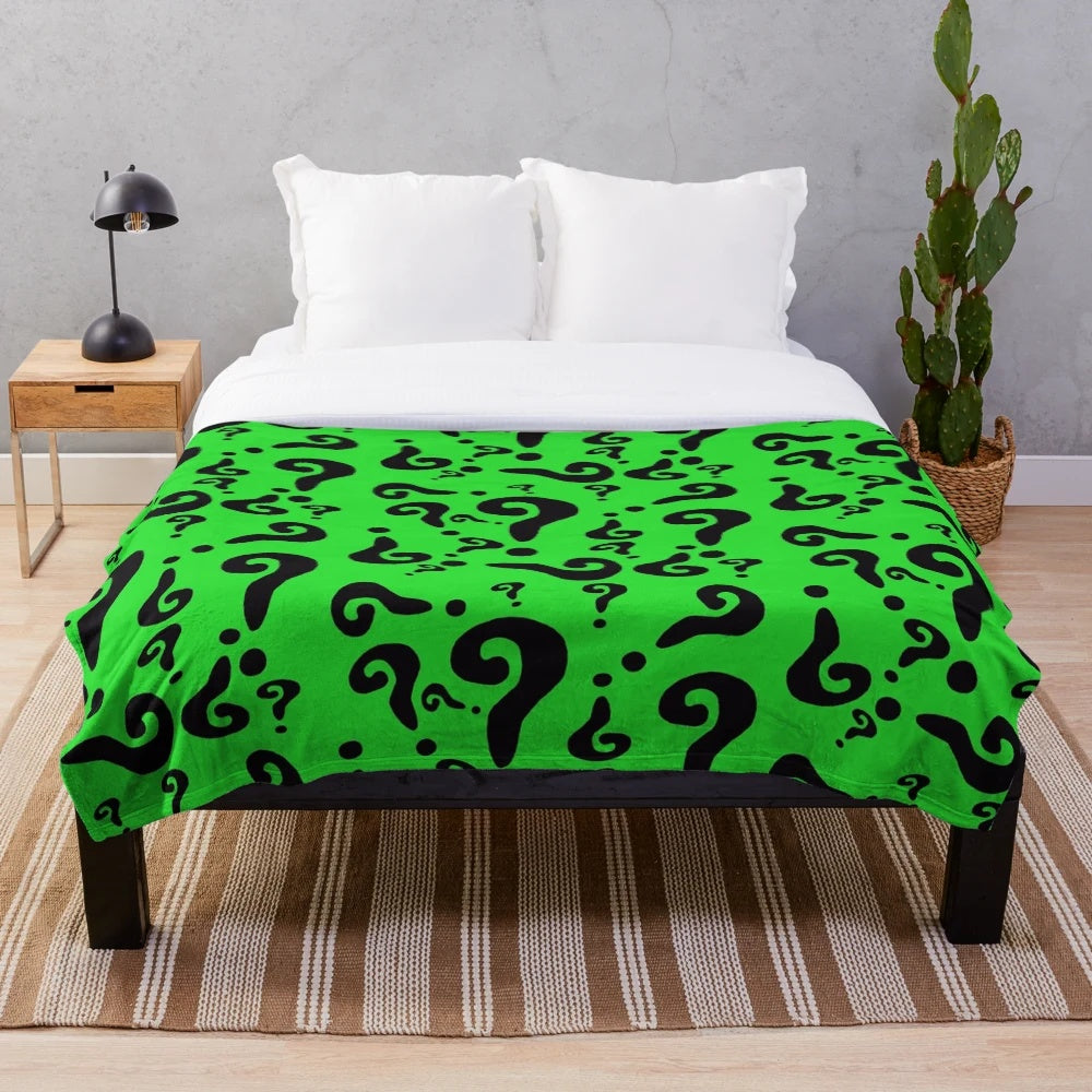 Riddler-inspired plush blanket featuring a green and question mark design