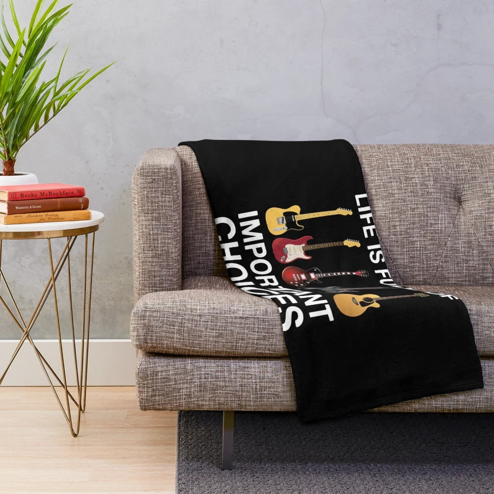 Guitar plush blanket with the text "Life Is Full of Important Choices