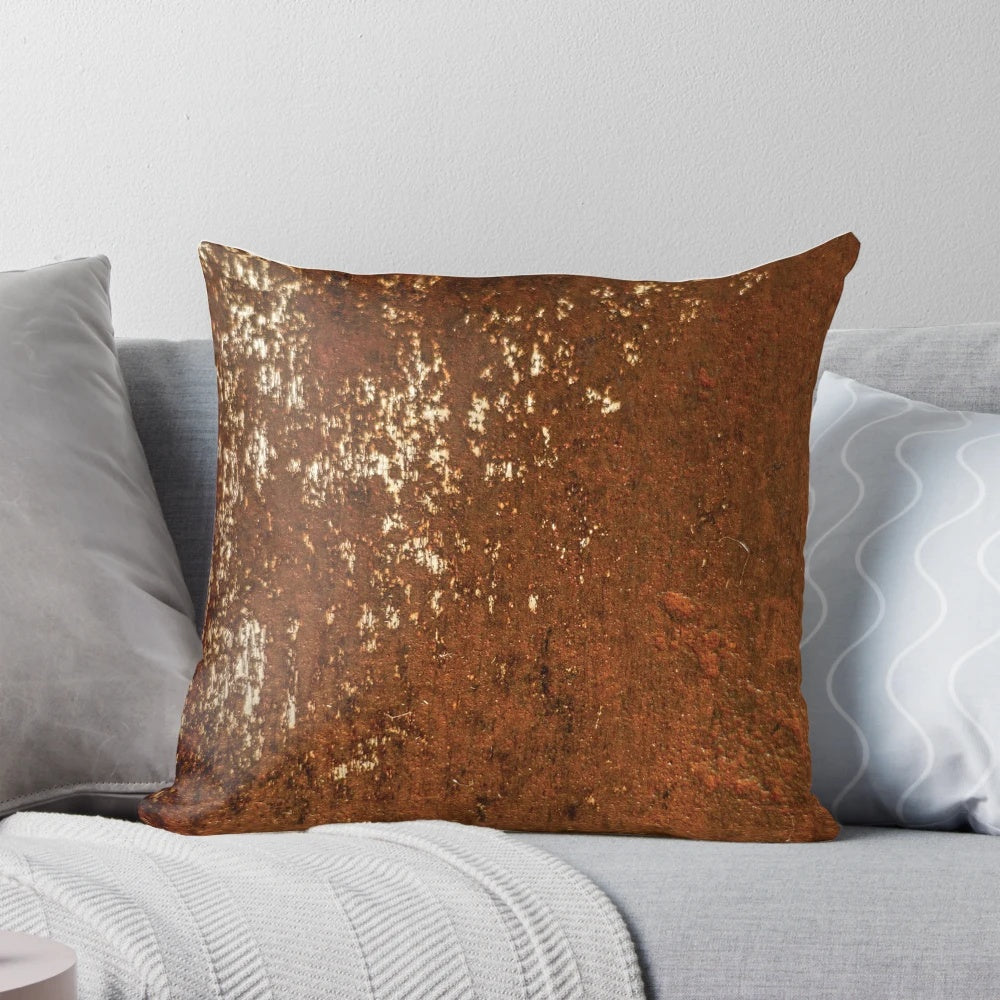 Rusty metal pillow with an aged, distressed design for an industrial-inspired home