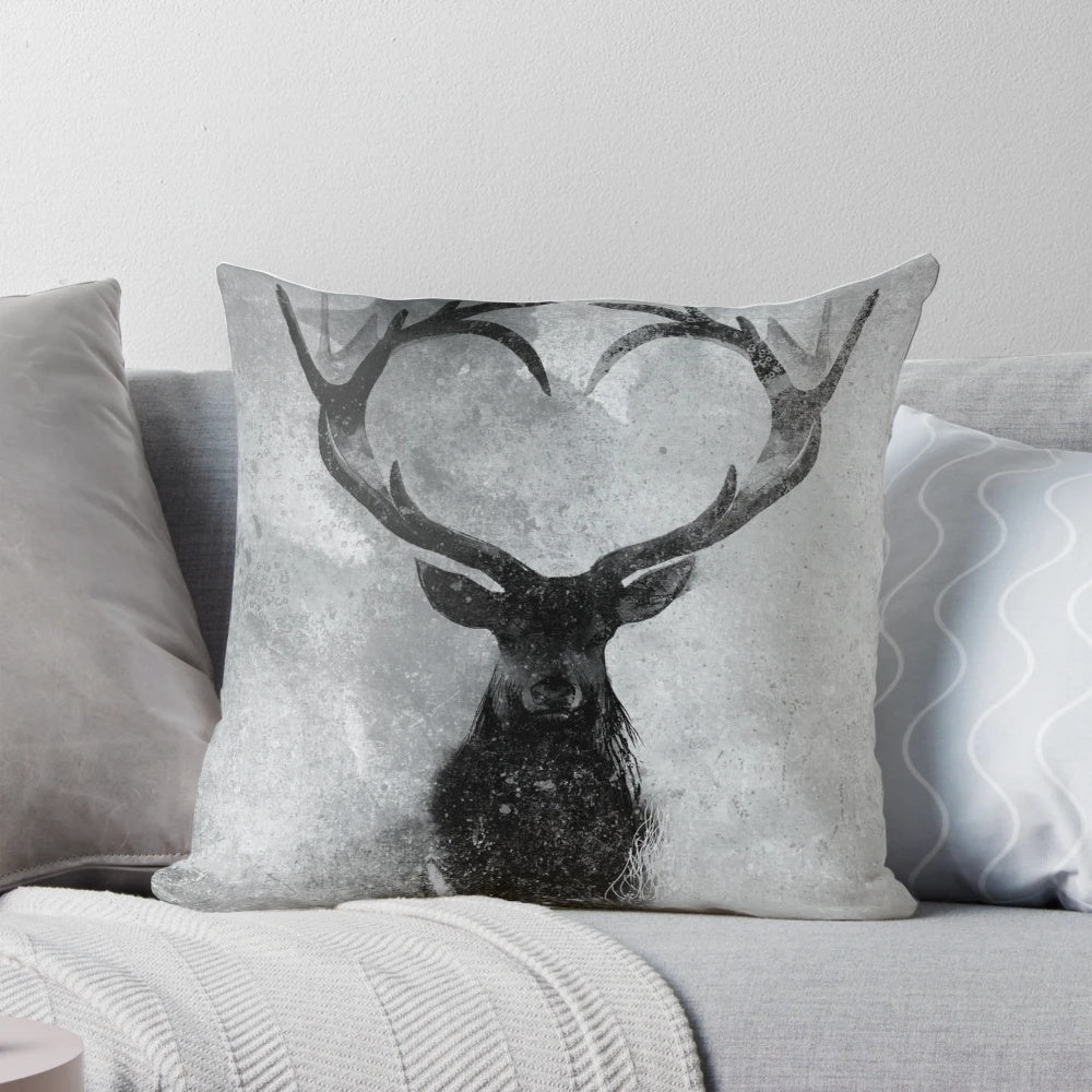 Closeup image of a decorative pillow featuring a realistic stag or deer design