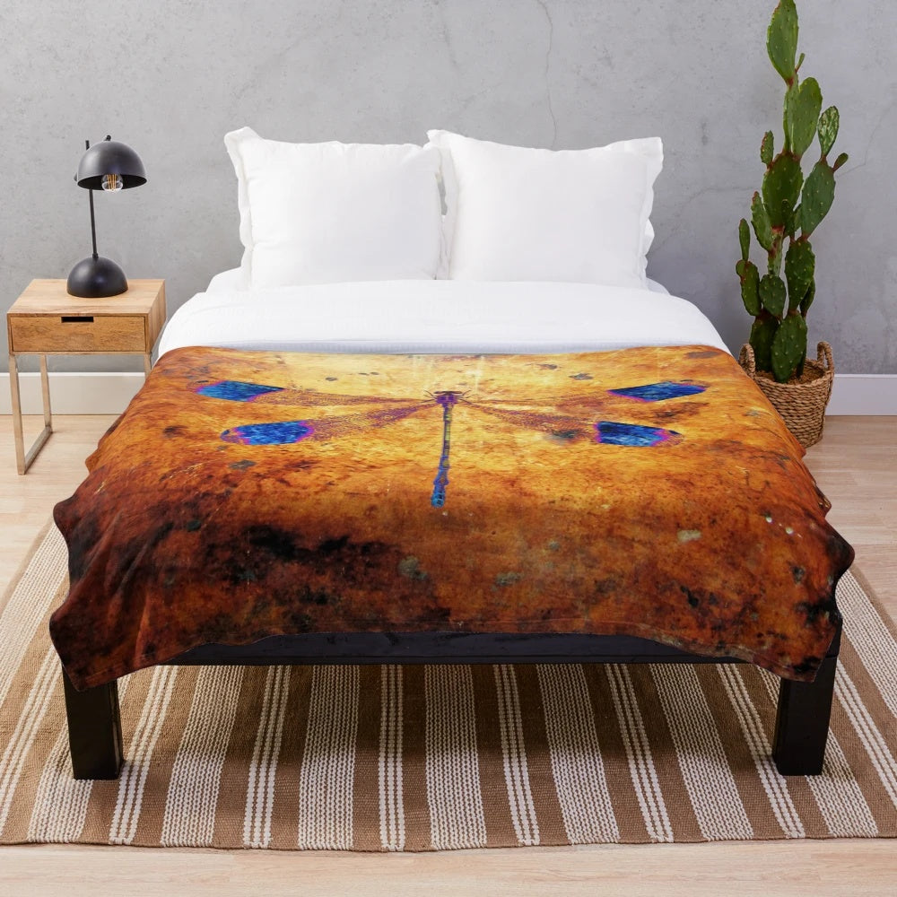 Dragonfly in amber plush blanket with a nature-inspired, distressed design