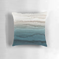 Decorative throw pillow featuring a watercolor abstract design of crashing ocean waves in shades of blue and green.