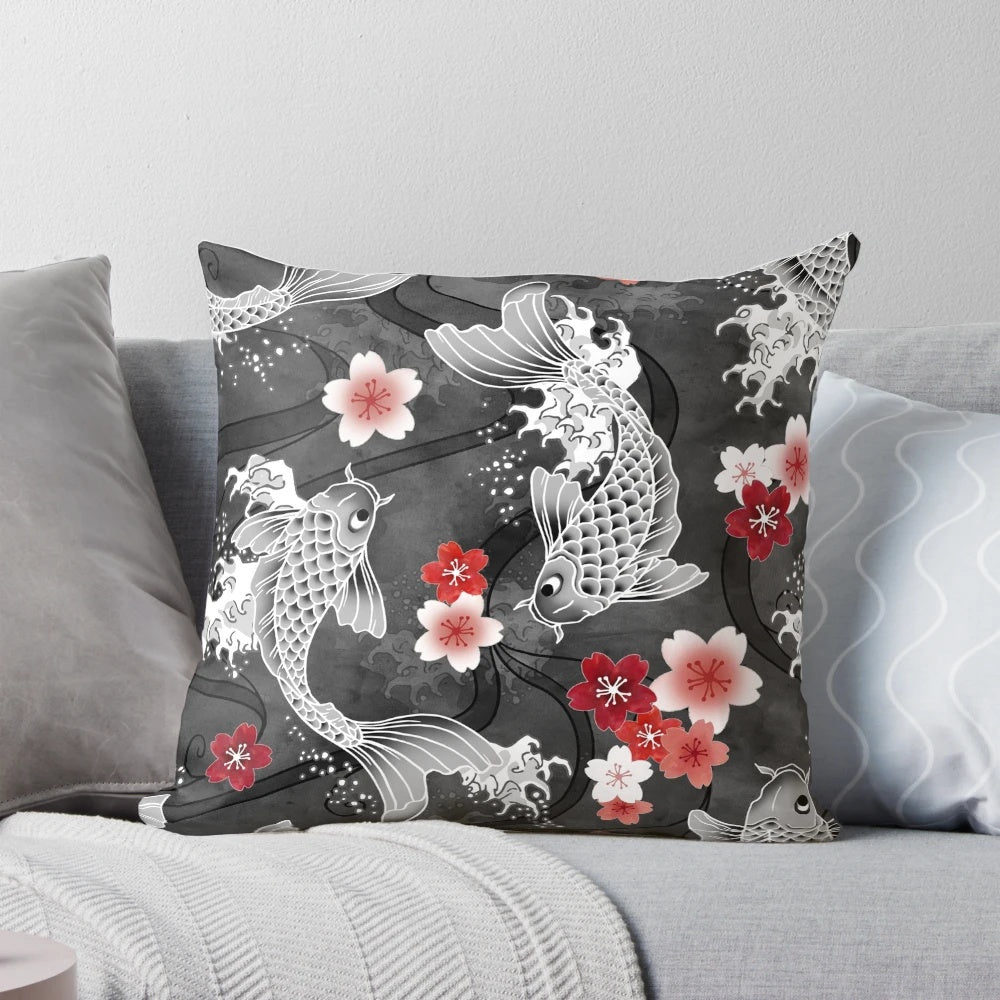 Decorative pillow featuring a watercolor painting of koi fish swimming among cherry blossoms