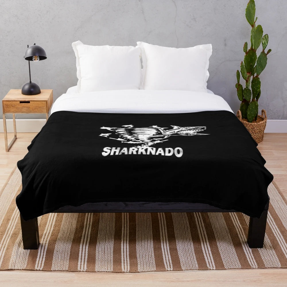 Sharknado-inspired plush blanket featuring iconic shark imagery