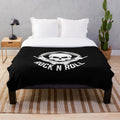 Plush blanket featuring a skull and bones design for rock and roll enthusiasts