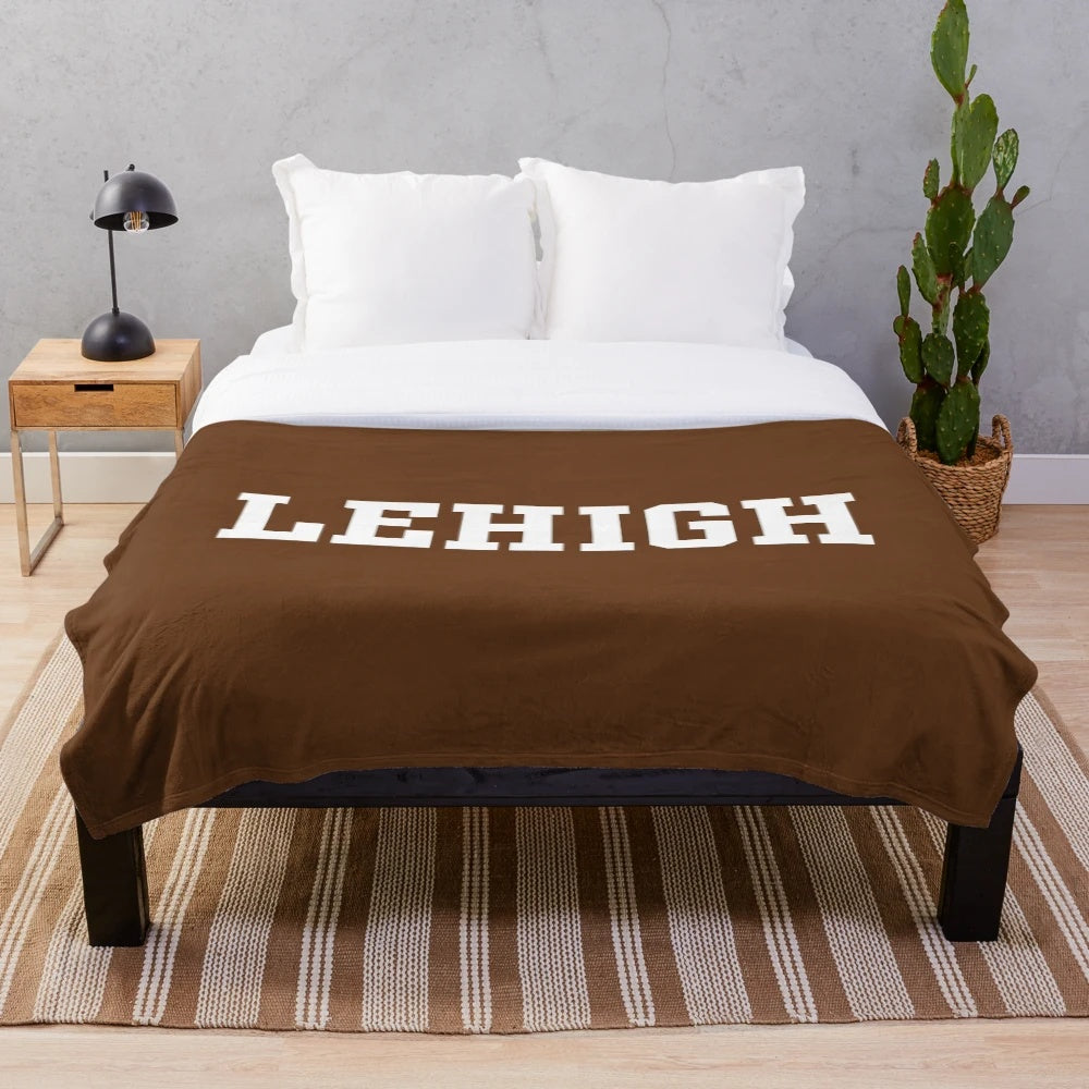 Soft and cozy plush blanket featuring the Lehigh Mountain Hawks wordmark logo