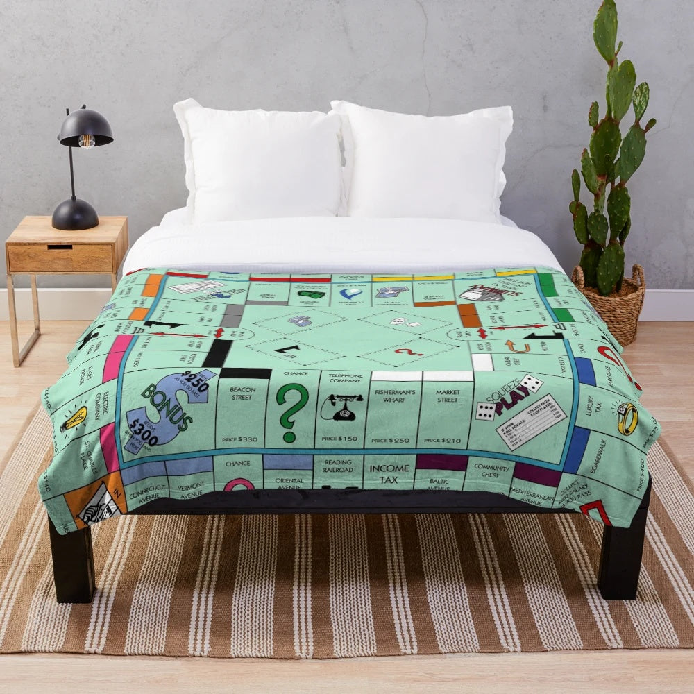 Soft and cozy Monopoly-themed plush blanket