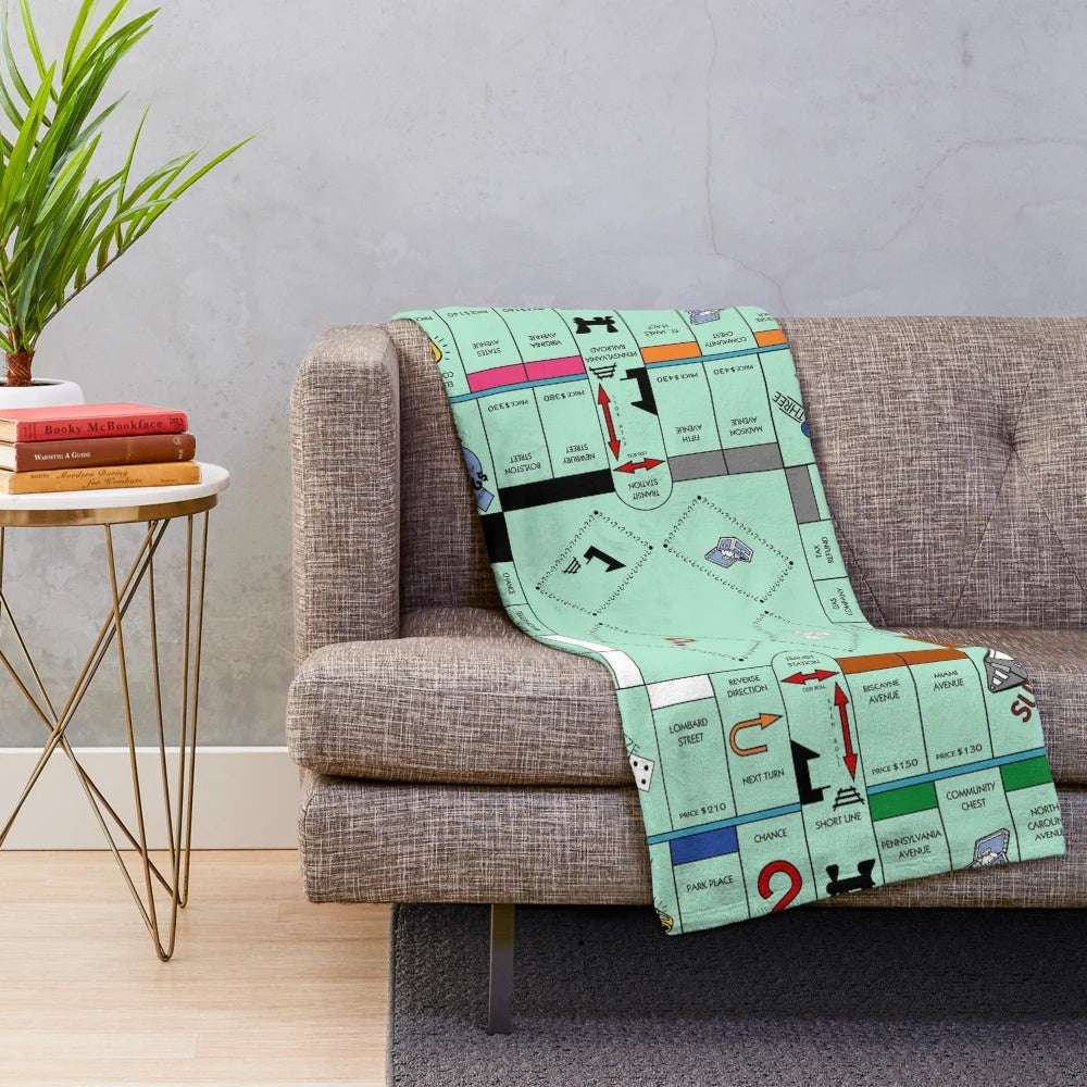 Soft and cozy Monopoly-themed plush blanket