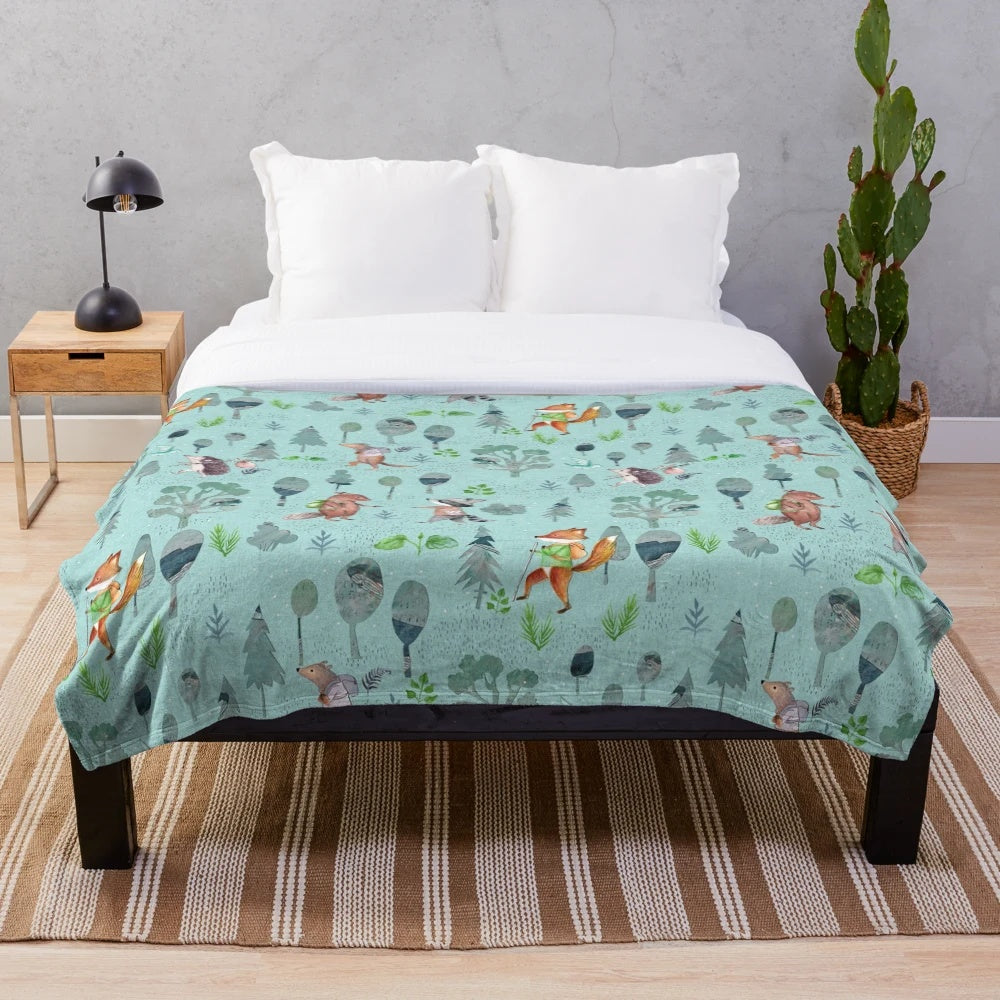 Cozy plush blanket with woodland forest animals