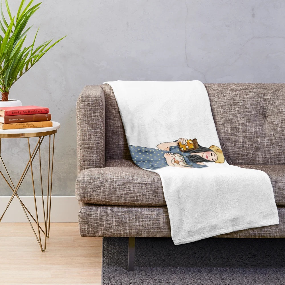 Plush blanket featuring a girl with paper hobbies
