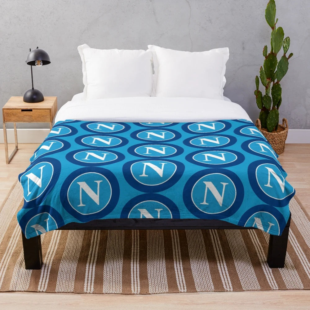 Soft and plush blanket featuring the Napoli logo for soccer fans