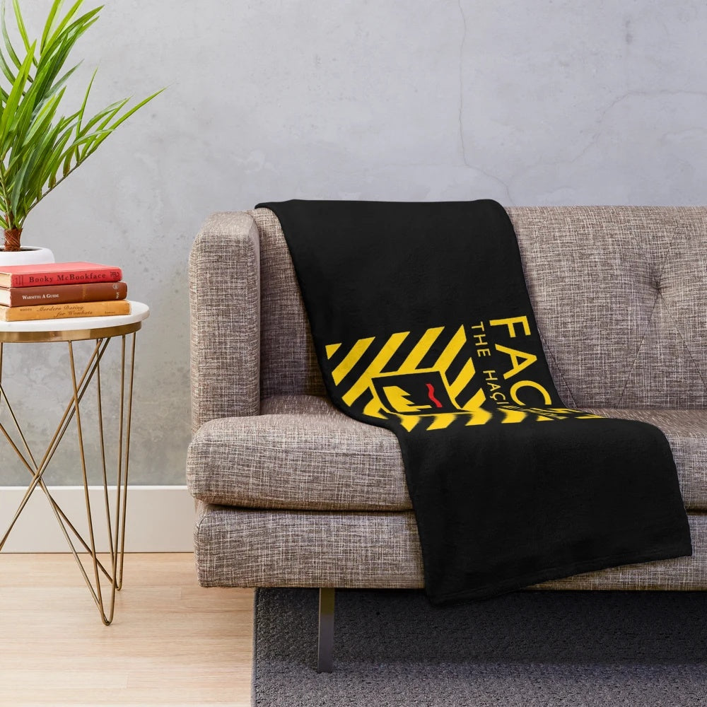 Plush blanket with The Hacienda logo and essential merchandise design