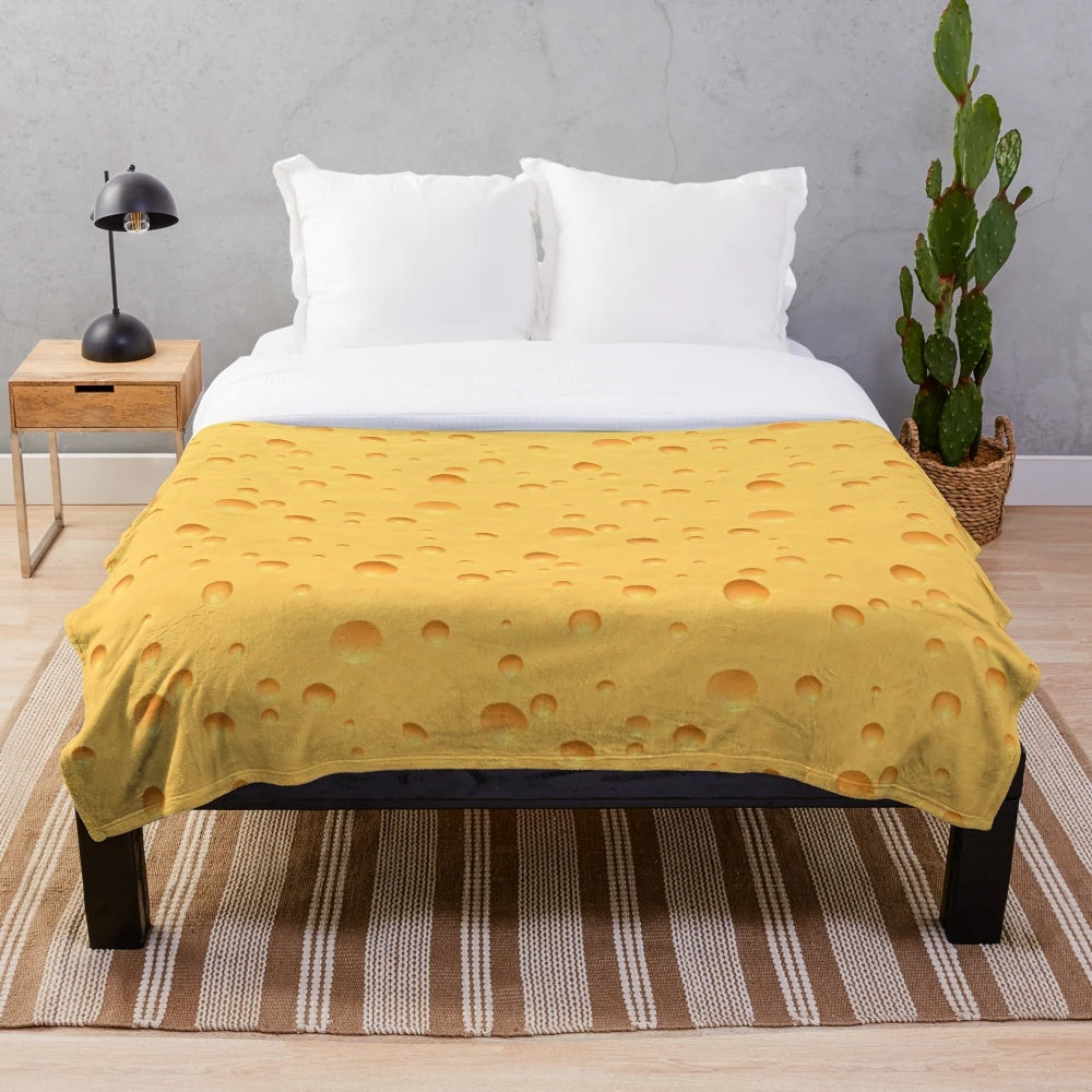 Swiss cheese-themed plush blanket