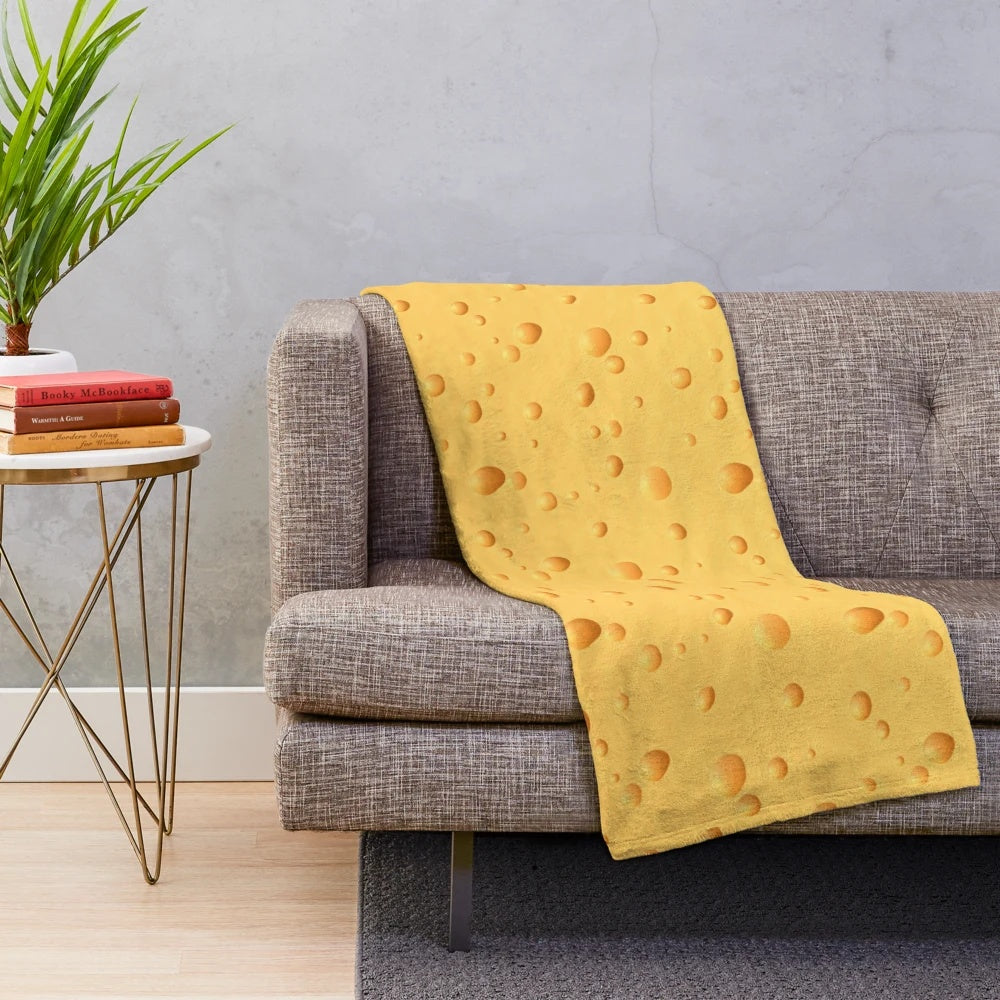 Swiss cheese-themed plush blanket
