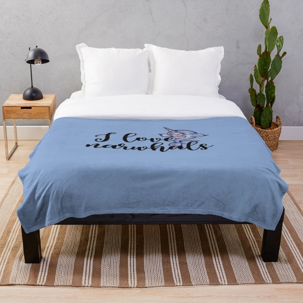 Cozy plush narwhal-themed blanket for snuggling