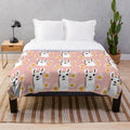 Pink plush blanket with a cute llama design