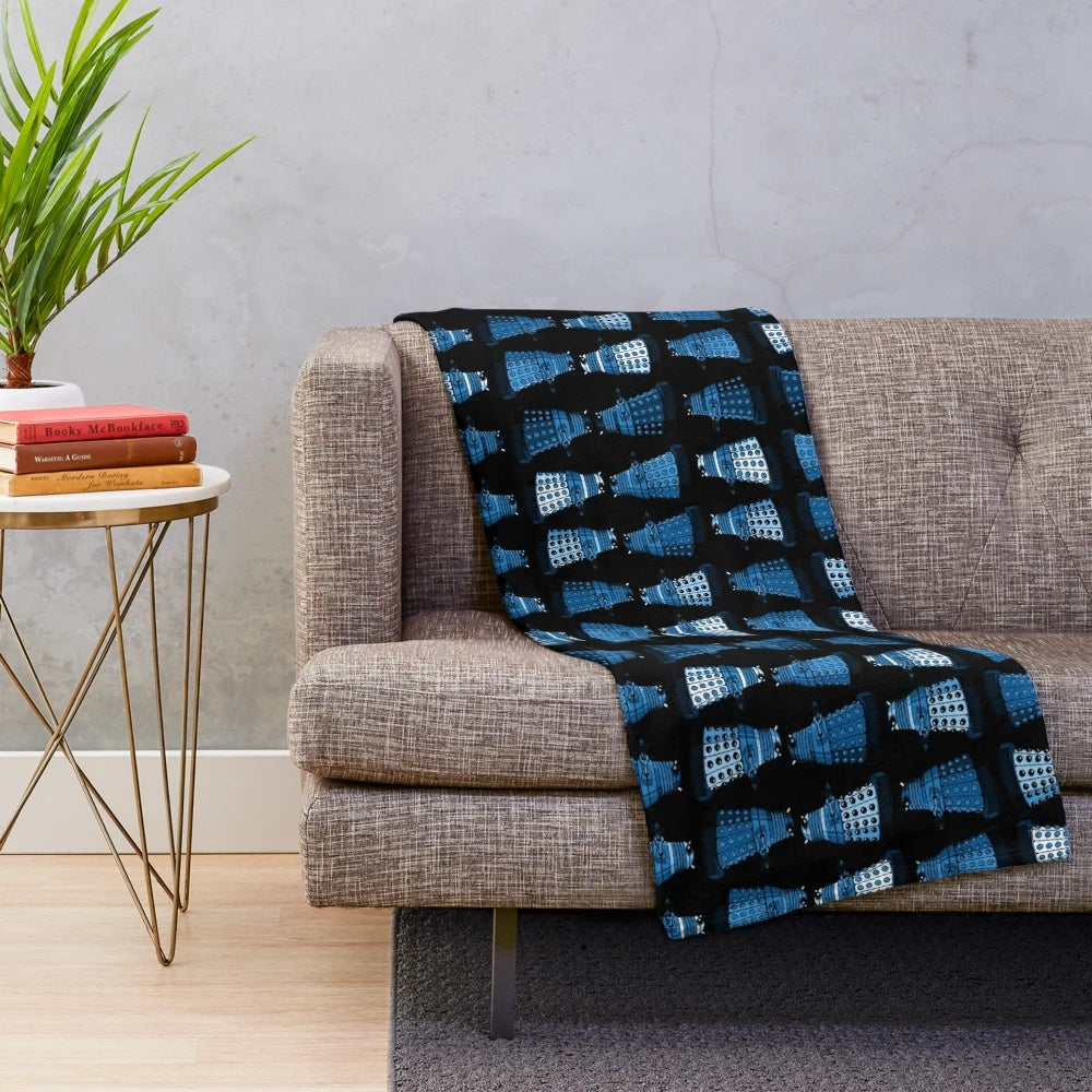 Blue plush blanket with Doctor Who inspired design