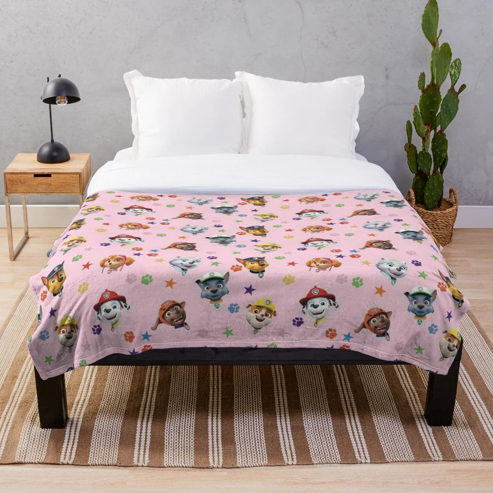 Paw print plush blanket featuring the Paw Patrol characters