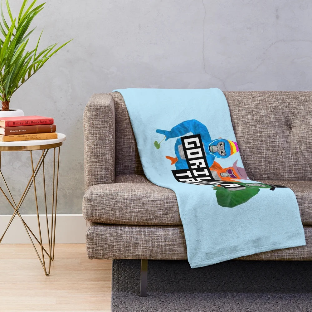 Soft and cozy plush blanket featuring the Gorilla Tag game logo and characters