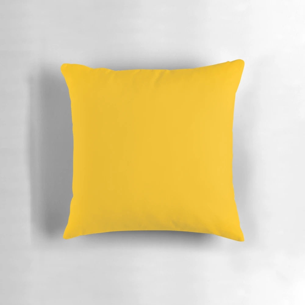 Solid yellow amber colored pillow with a plain, simple design.