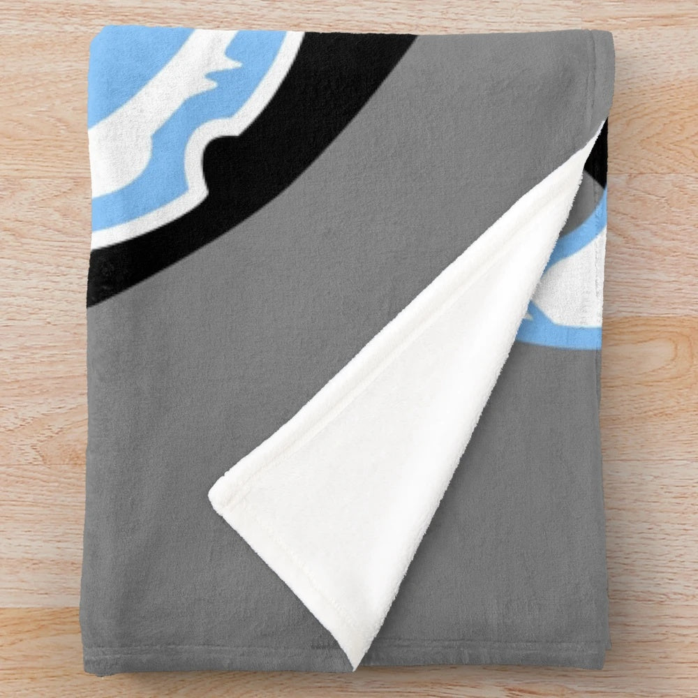 Plush blanket featuring Chicago sports team logos and imagery