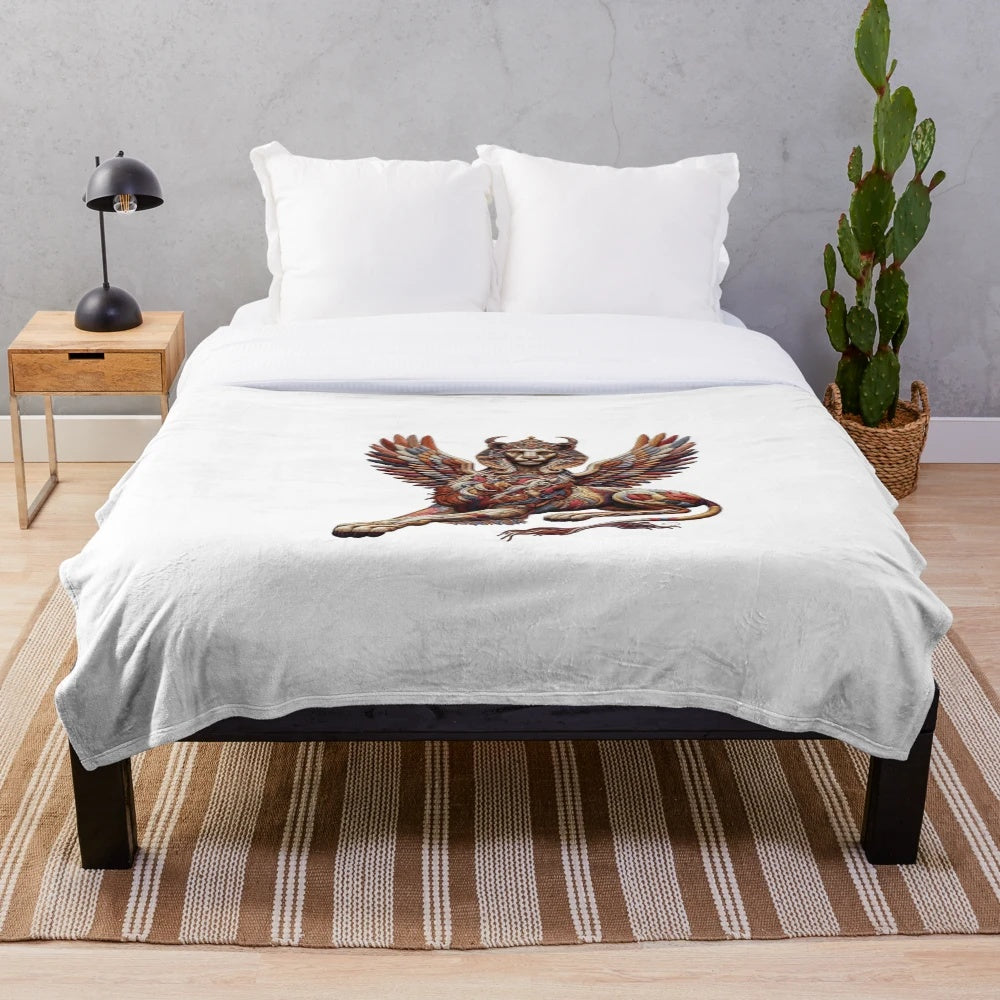 Embroidered sphinx-themed plush blanket
