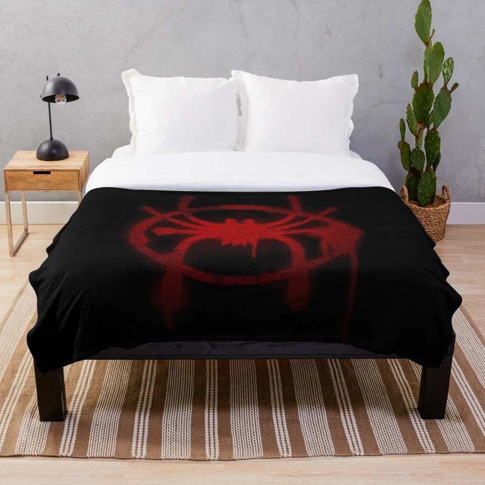 Spider-Verse inspired plush blanket featuring the spider symbol of Miles Morales