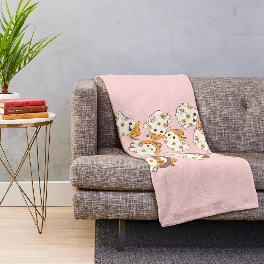 Soft and cozy plush blanket with spooky Halloween-themed design