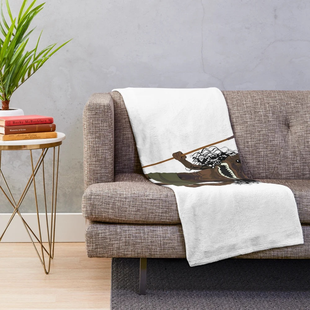 Spooky tribal-inspired plush blanket featuring zuni doll-like design